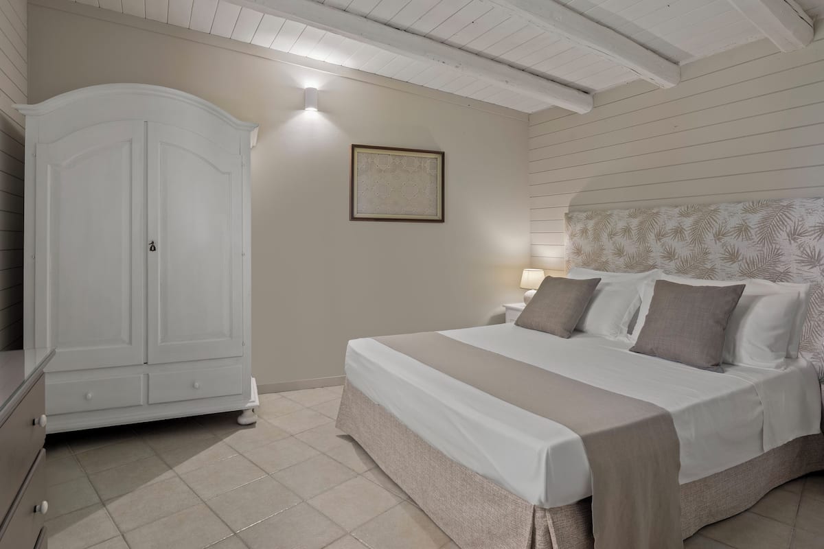 Standard Room, 2 Bedrooms | In-room safe, laptop workspace, blackout drapes, free WiFi