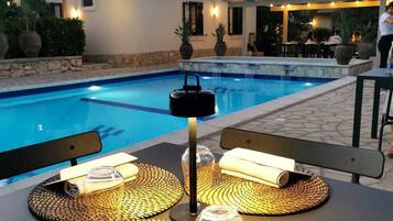 Dinner served, local cuisine, pool views