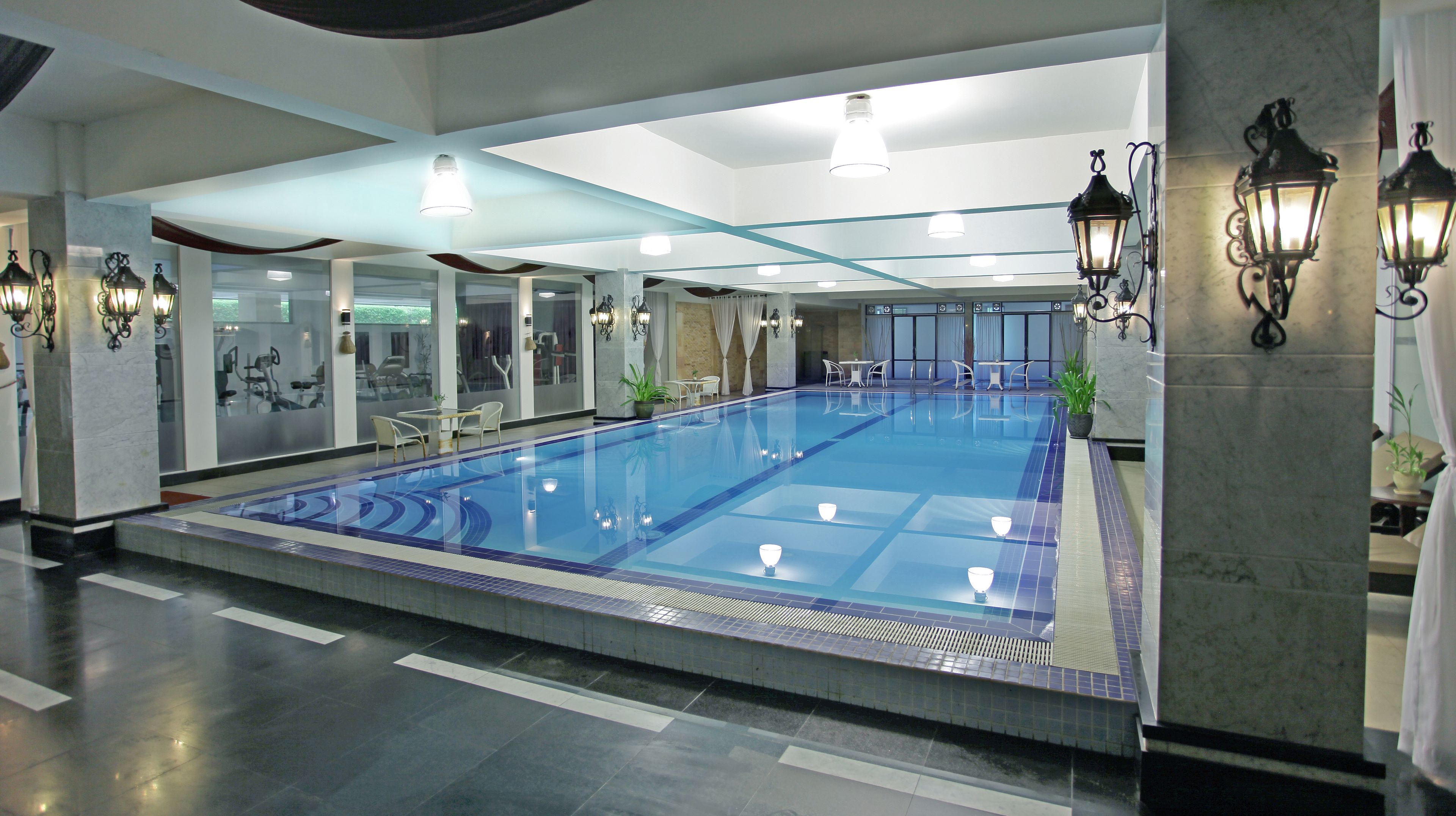 indoor pool, outdoor pool, pool umbrellas, pool loungers
