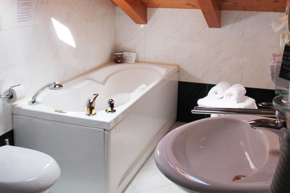 Superior Double Room | Bathroom | Shower, designer toiletries, hair dryer, bathrobes
