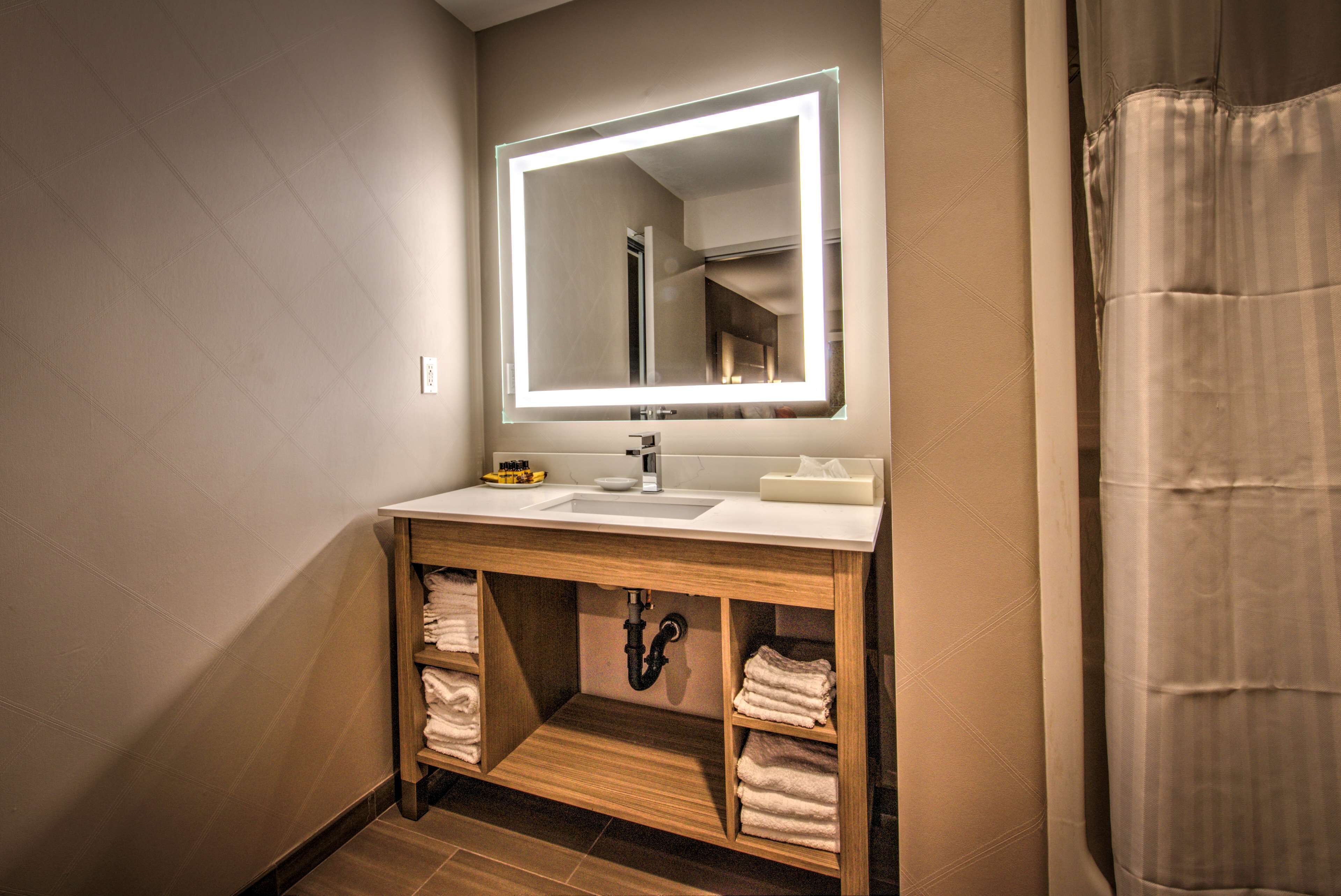 suite, 1 king bed, non smoking (oversized room;with sofabed) | bathroom | free toiletries, hair dryer, towels, soap