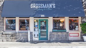 A storefront with a sign reading "GROSSMAN'S Noshery & Bar" at 308½. - Hotel La Rose (Santa Rosa)
