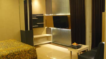 Habitación Deluxe | Ropa de cama de alta calidad, escritorio, camas extra y wifi gratis