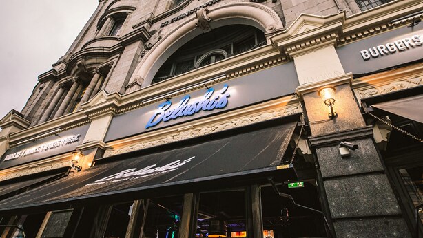A building with a sign for 'Burgers' and 'Beverly's' on the facade. - St Christopher's Inn Hammersmith (London)