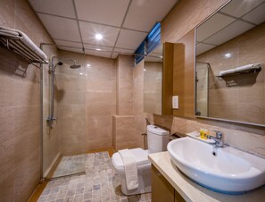 Shower, free toiletries, hair dryer, slippers