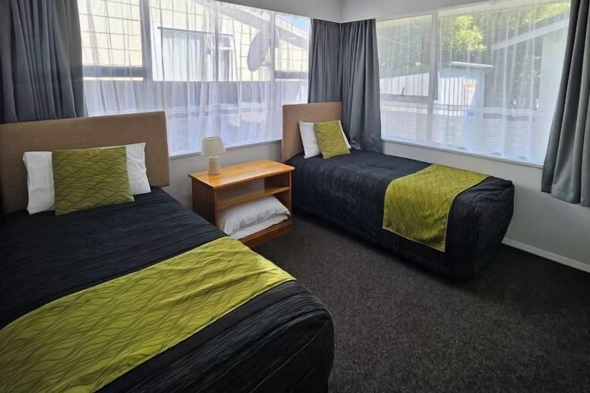 Blackout curtains, iron/ironing board, free WiFi, bed sheets