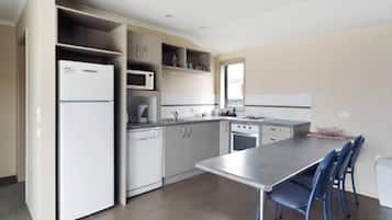 Apartamento ejecutivo, 1 habitación | Cocina privada | Microondas, hervidor eléctrico y tostadora