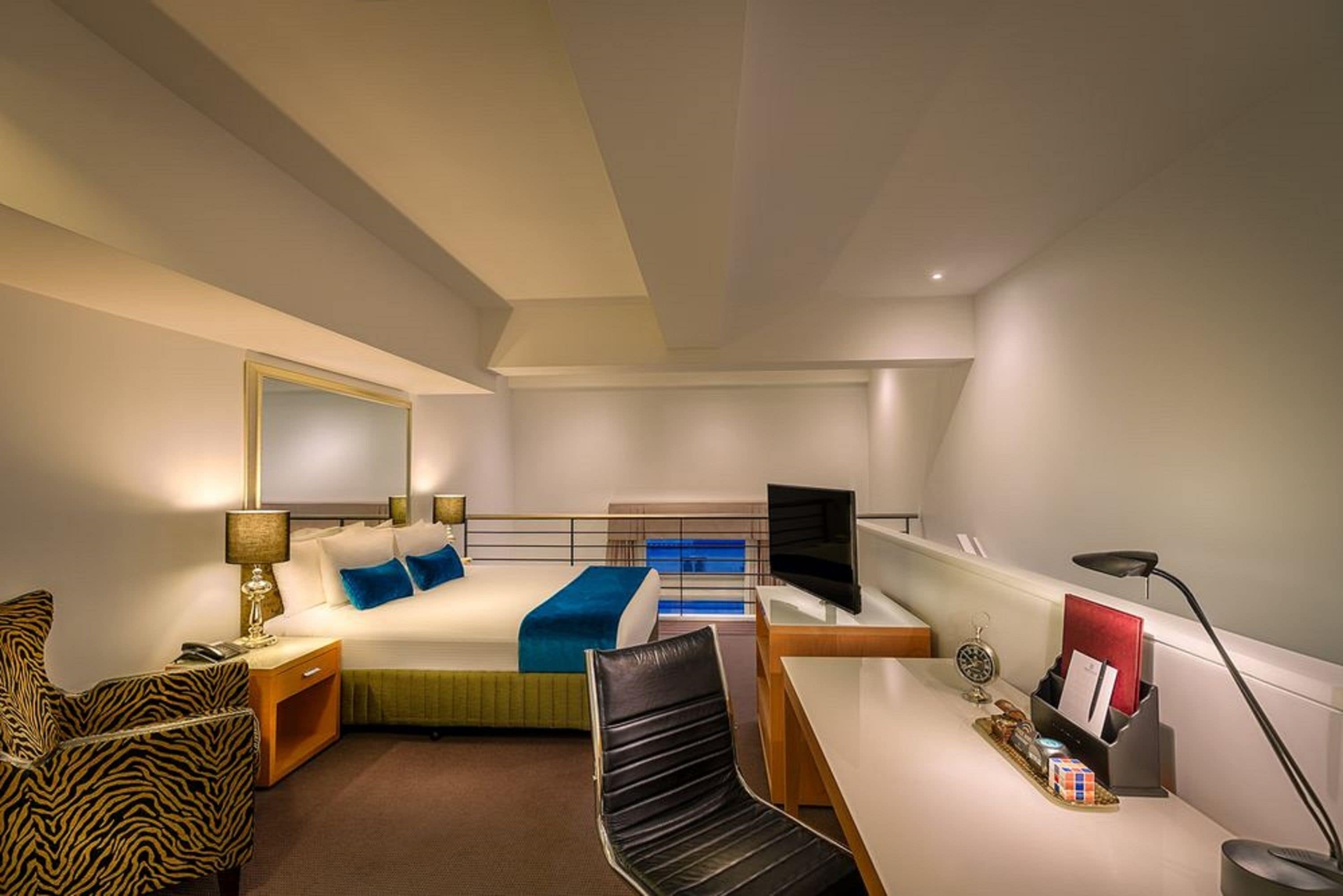 heritage loft apartment | in-room safe, individually decorated, desk, blackout curtains