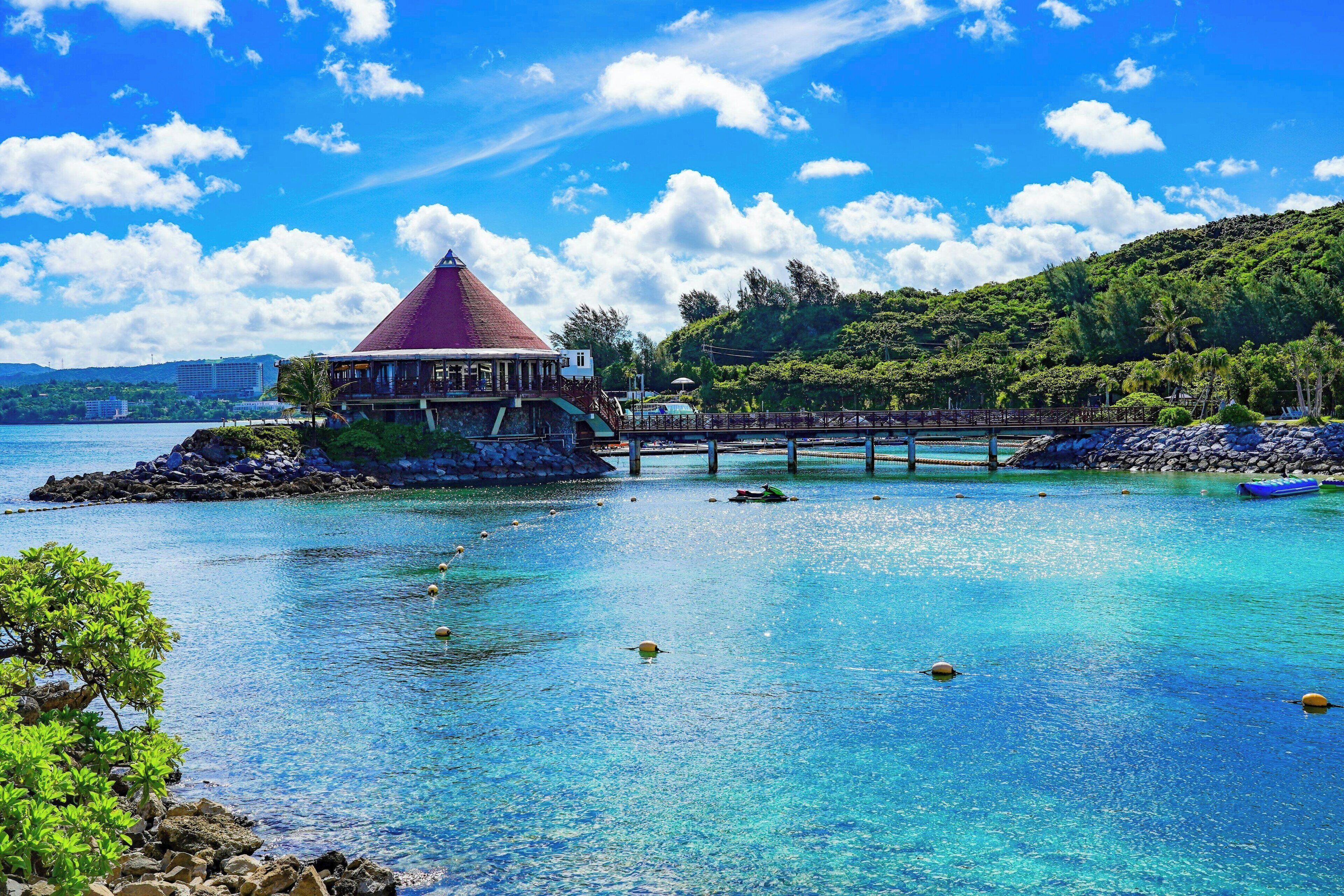 private beach, white sand, beach umbrellas, beach towels