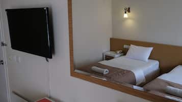 Standard Triple Room | Premium bedding, minibar, free WiFi, bed sheets