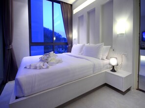 Familiesuite, 2 soverom | Safe på rommet, skrivebord, blendingsgardiner og barnesenger (inkludert)