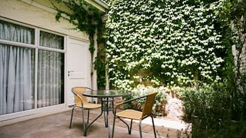 Economy Double Room, 1 Double Bed, Smoking, Garden Area | Terrace/patio