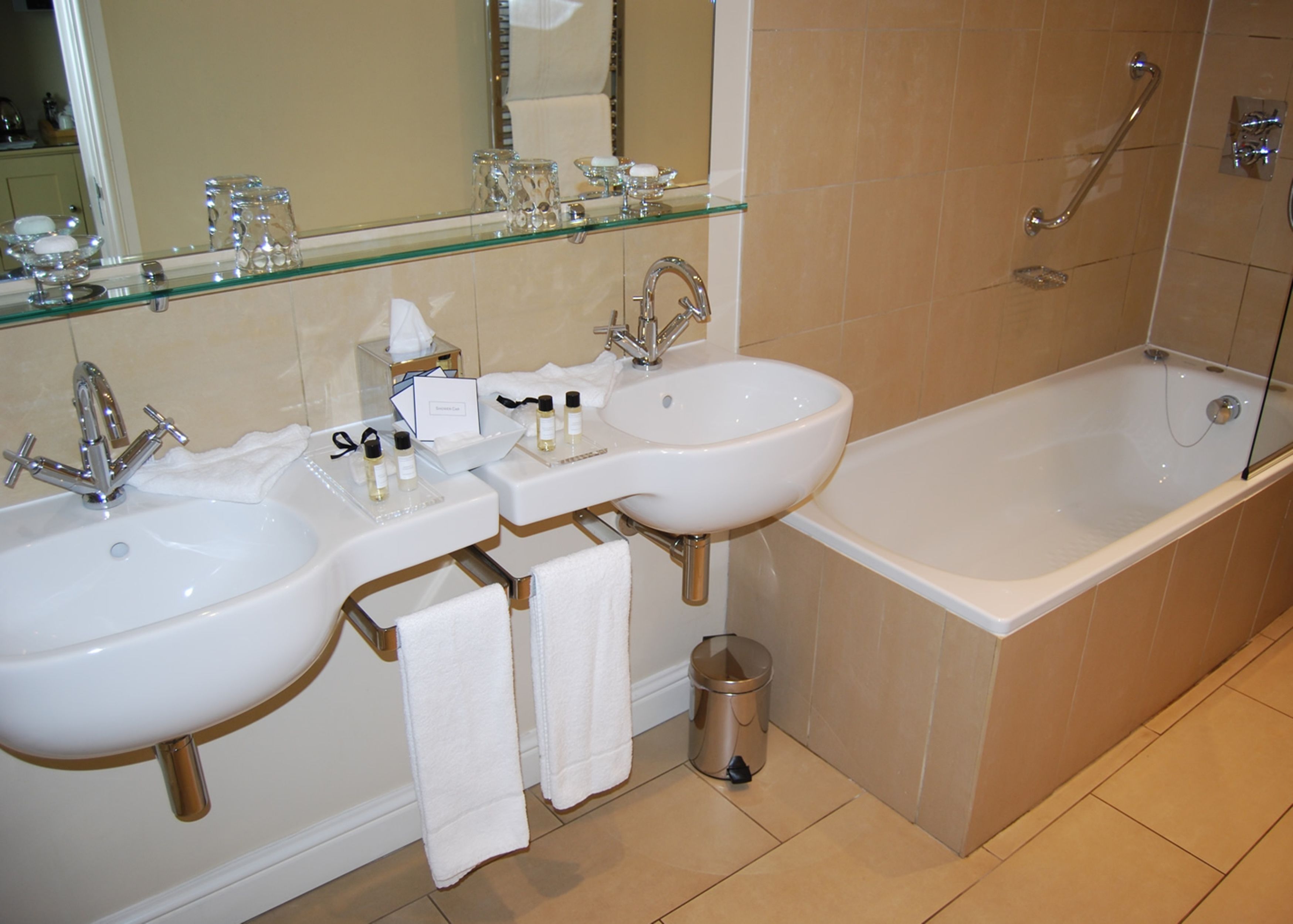 designer toiletries, hair dryer, bathrobes, towels