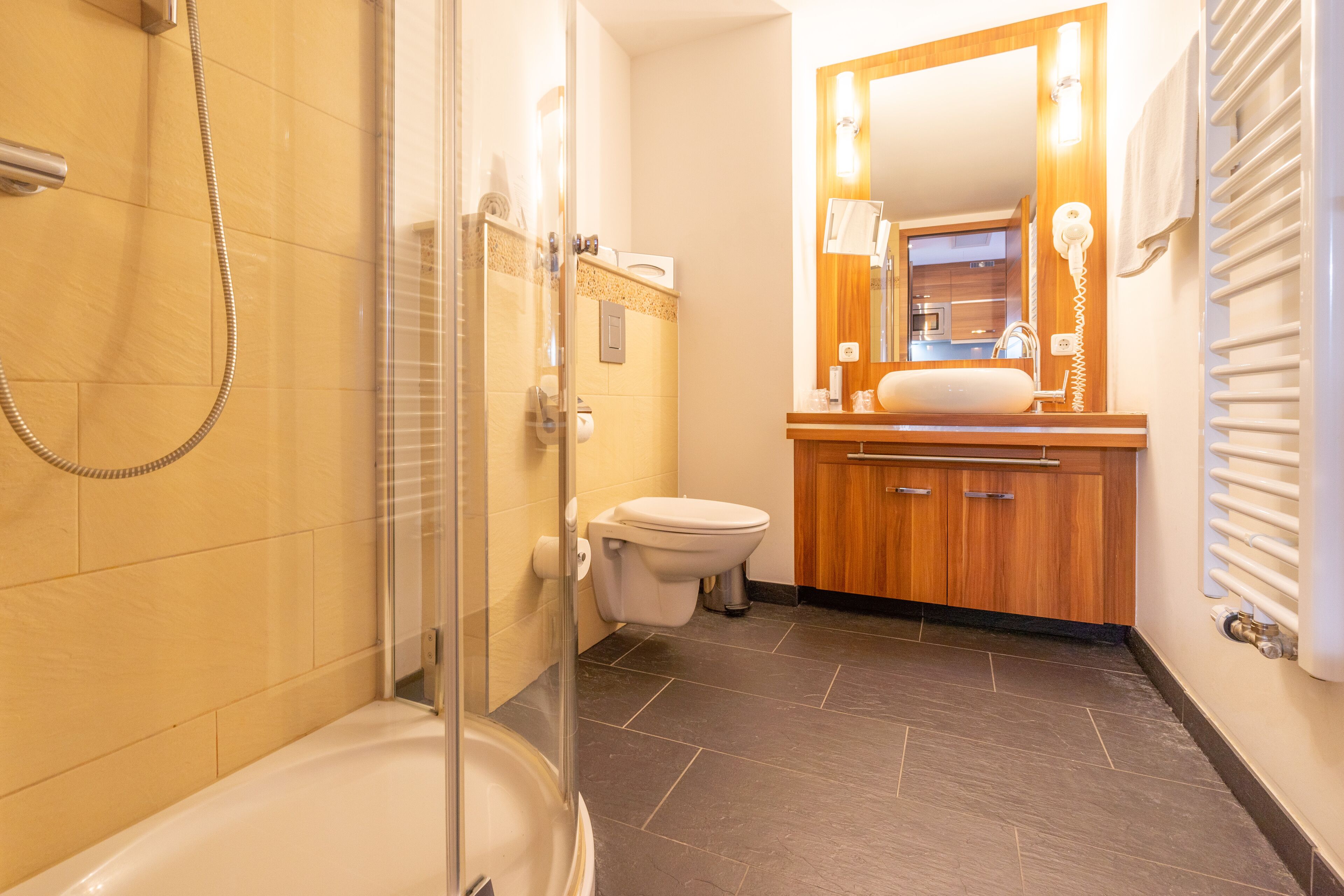 shower, free toiletries, hair dryer, towels