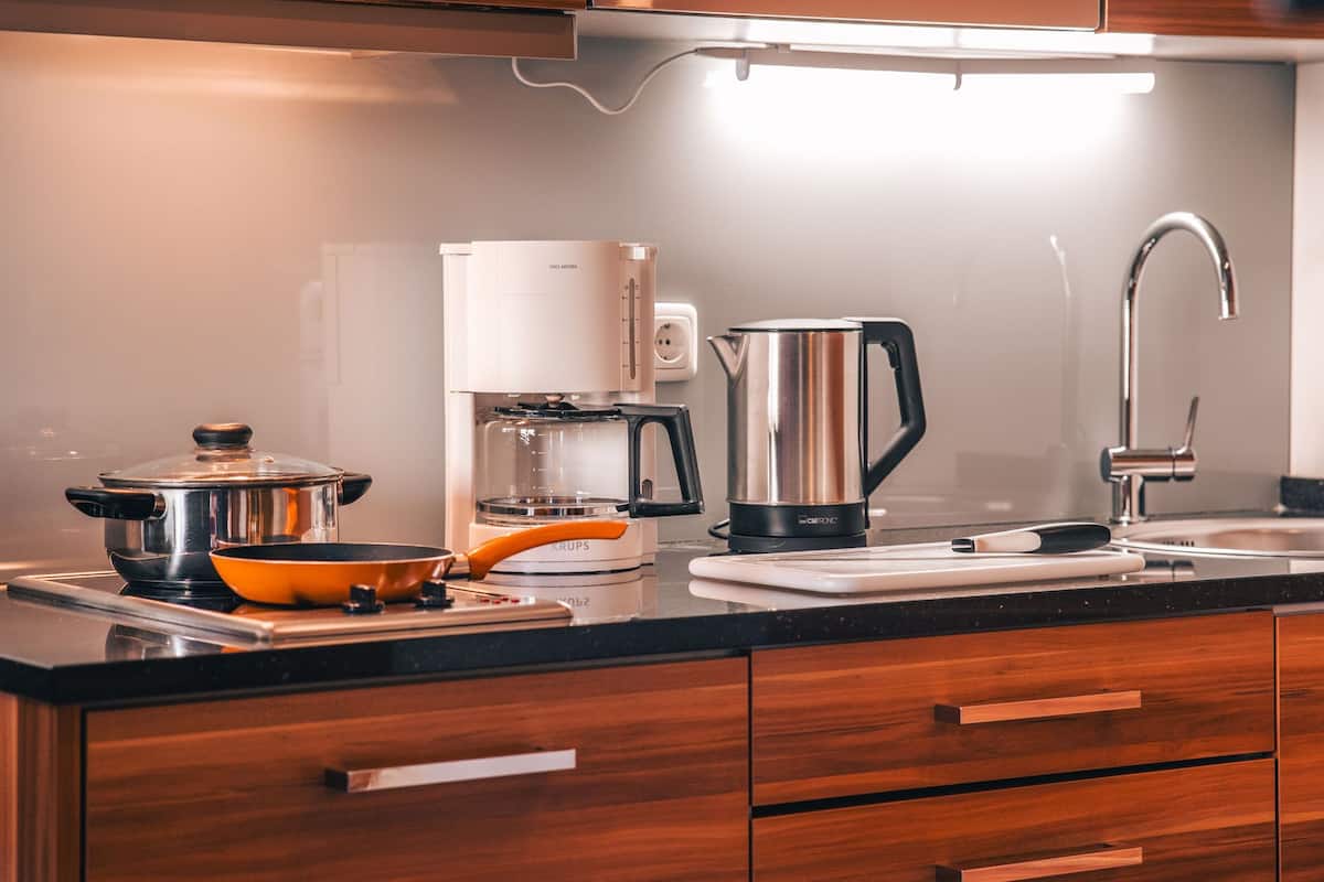 full-sized fridge, microwave, stovetop, coffee/tea maker