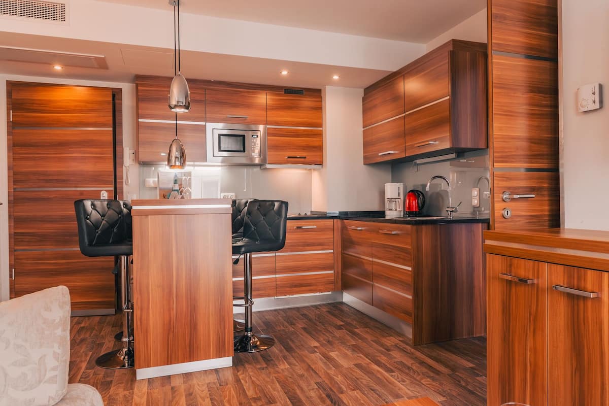 full-sized fridge, microwave, stovetop, coffee/tea maker