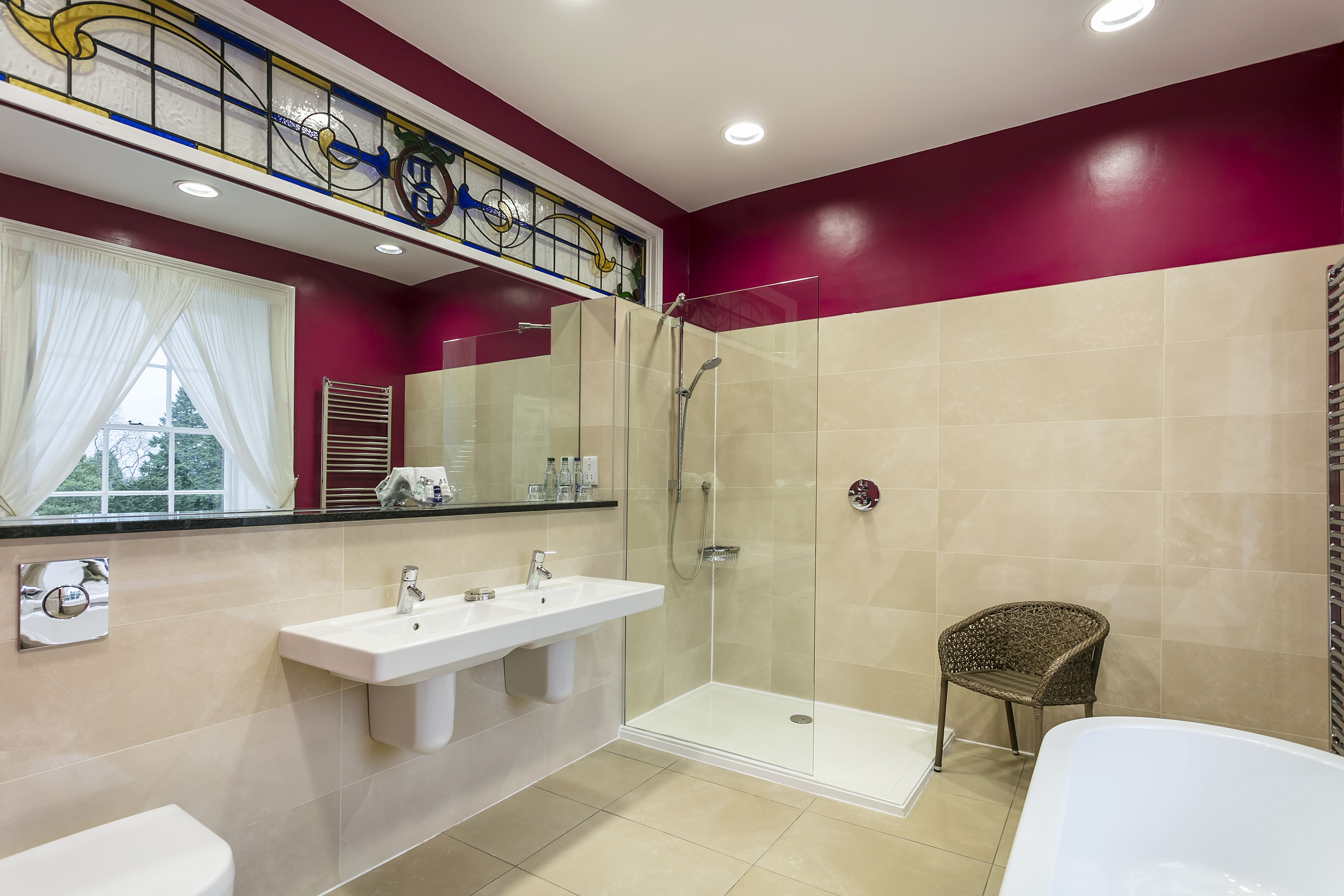 deluxe double room, 1 king bed | bathroom | combined shower/bathtub, free toiletries, hair dryer, bathrobes
