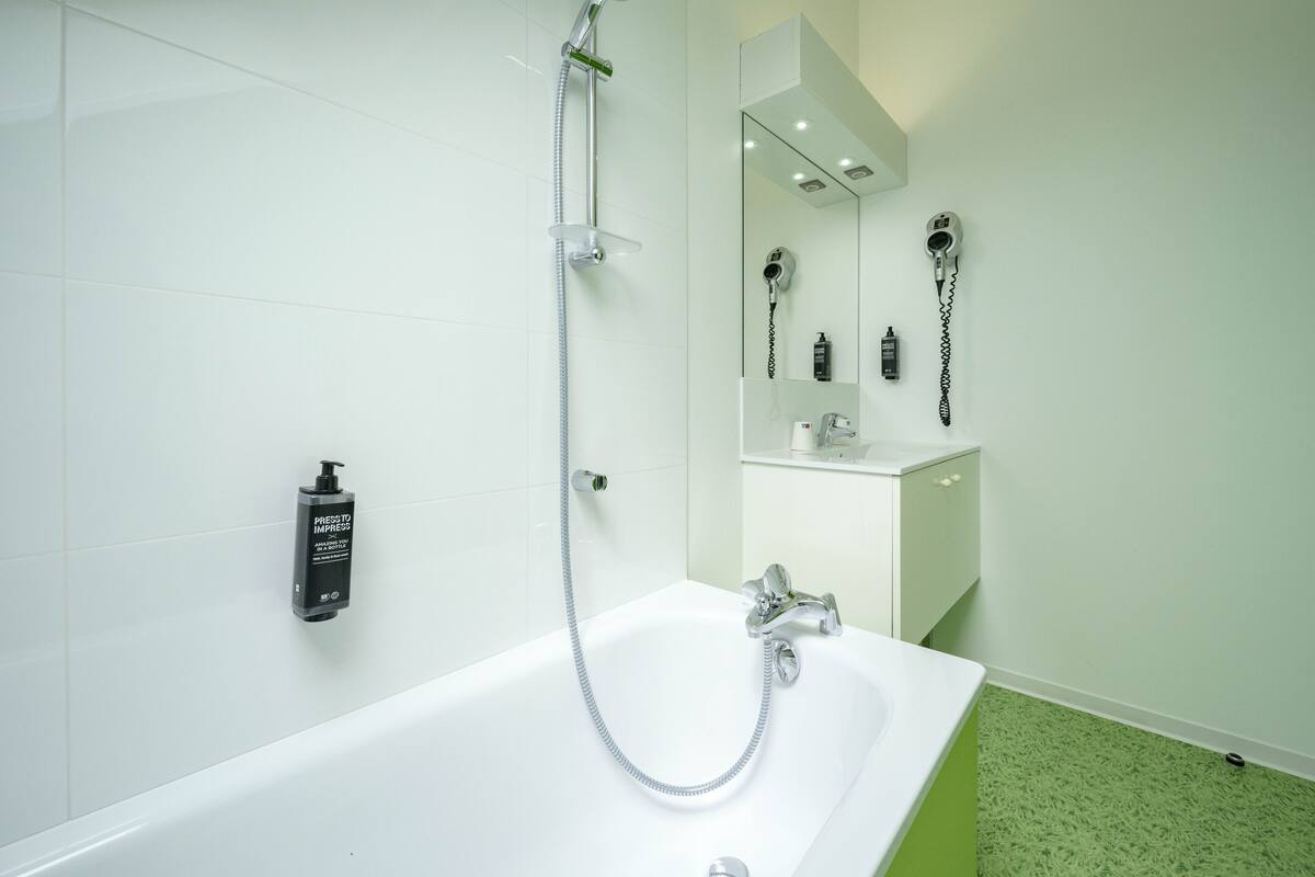 shower, eco-friendly toiletries, hair dryer, towels