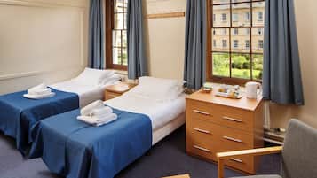 Standard Twin Room, 2 Twin Beds, Shared Bathroom | Desk, laptop workspace, free WiFi, bed sheets
