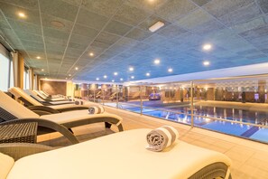 Indoor pool, outdoor pool, open 7:00 AM to 11:00 PM, pool loungers