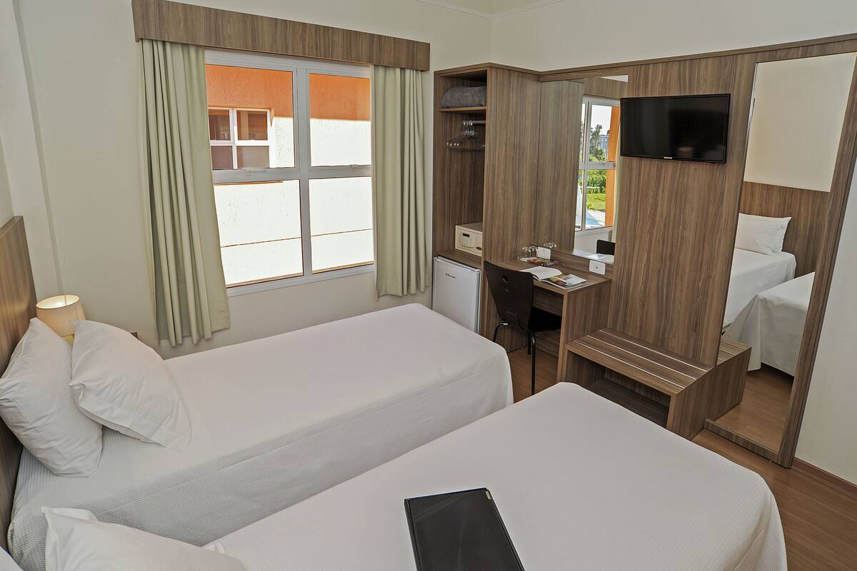 room, 2 single beds | minibar, in-room safe, desk, laptop workspace