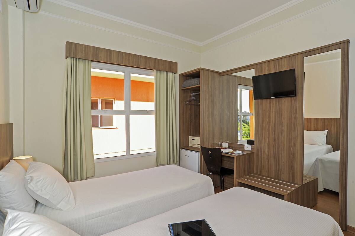 Room, 2 Twin Beds | Minibar, in-room safe, desk, laptop workspace