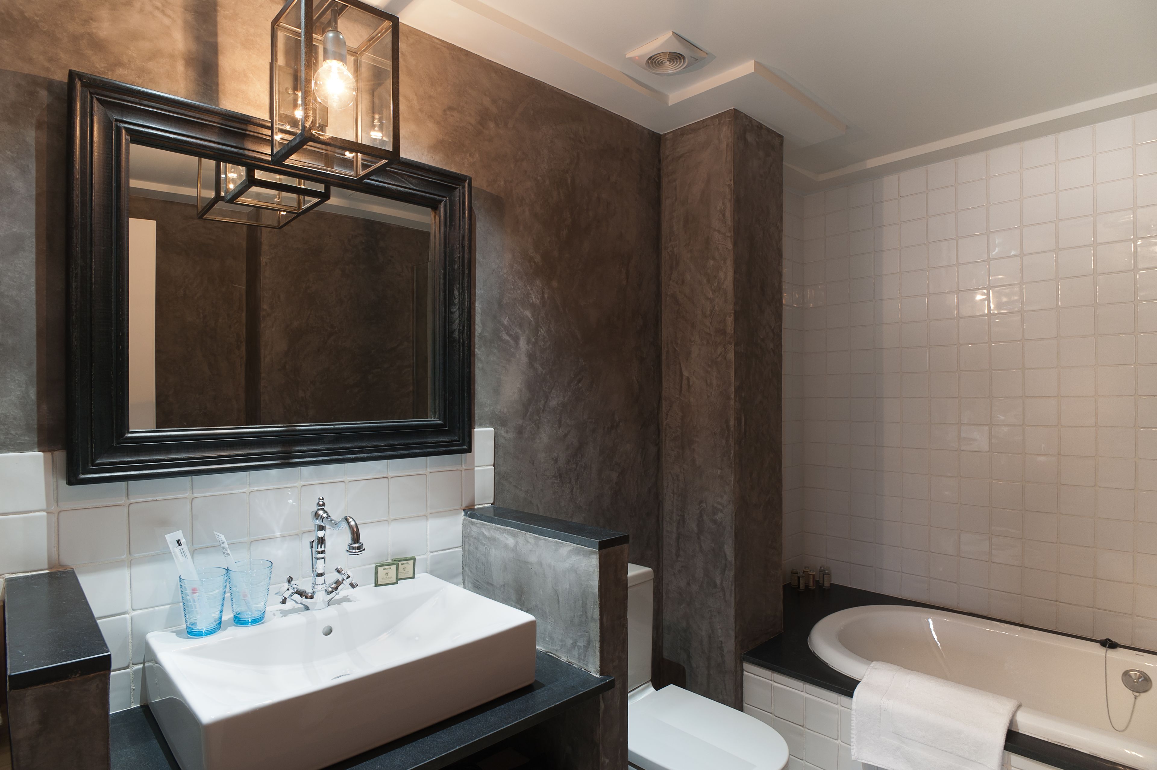 deluxe suite | bathroom | free toiletries, hair dryer, bathrobes, slippers