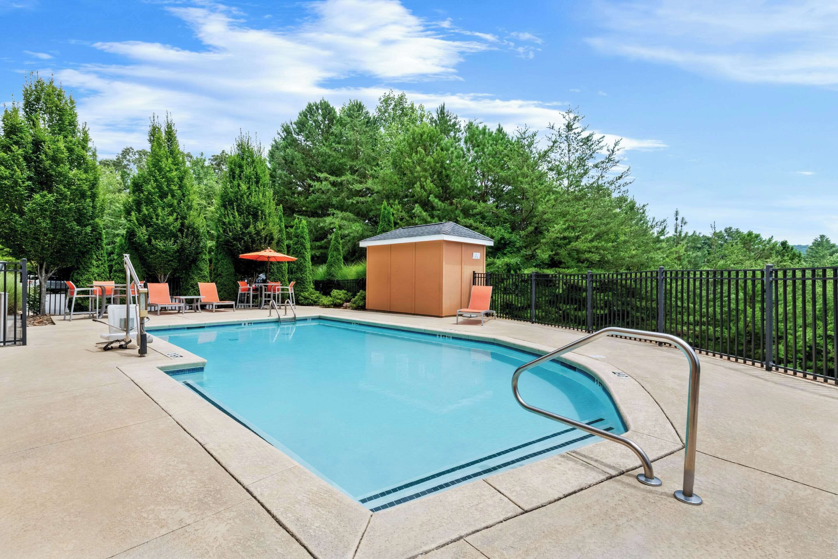 Seasonal outdoor pool, pool loungers