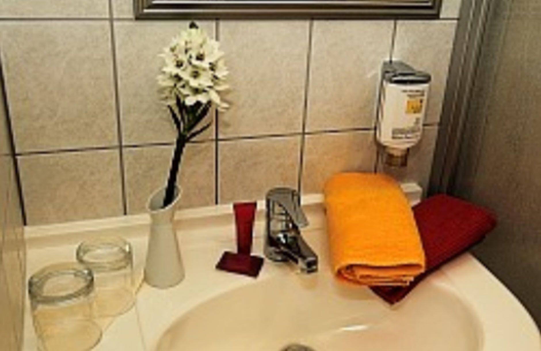 hair dryer, bathrobes, towels