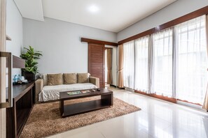 Suite | Zona de estar | Una televisión de pantalla plana