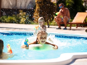 Indoor pool, outdoor pool, open 10 AM to 6 PM, pool umbrellas