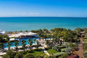 Private beach, white sand, sun loungers, beach umbrellas