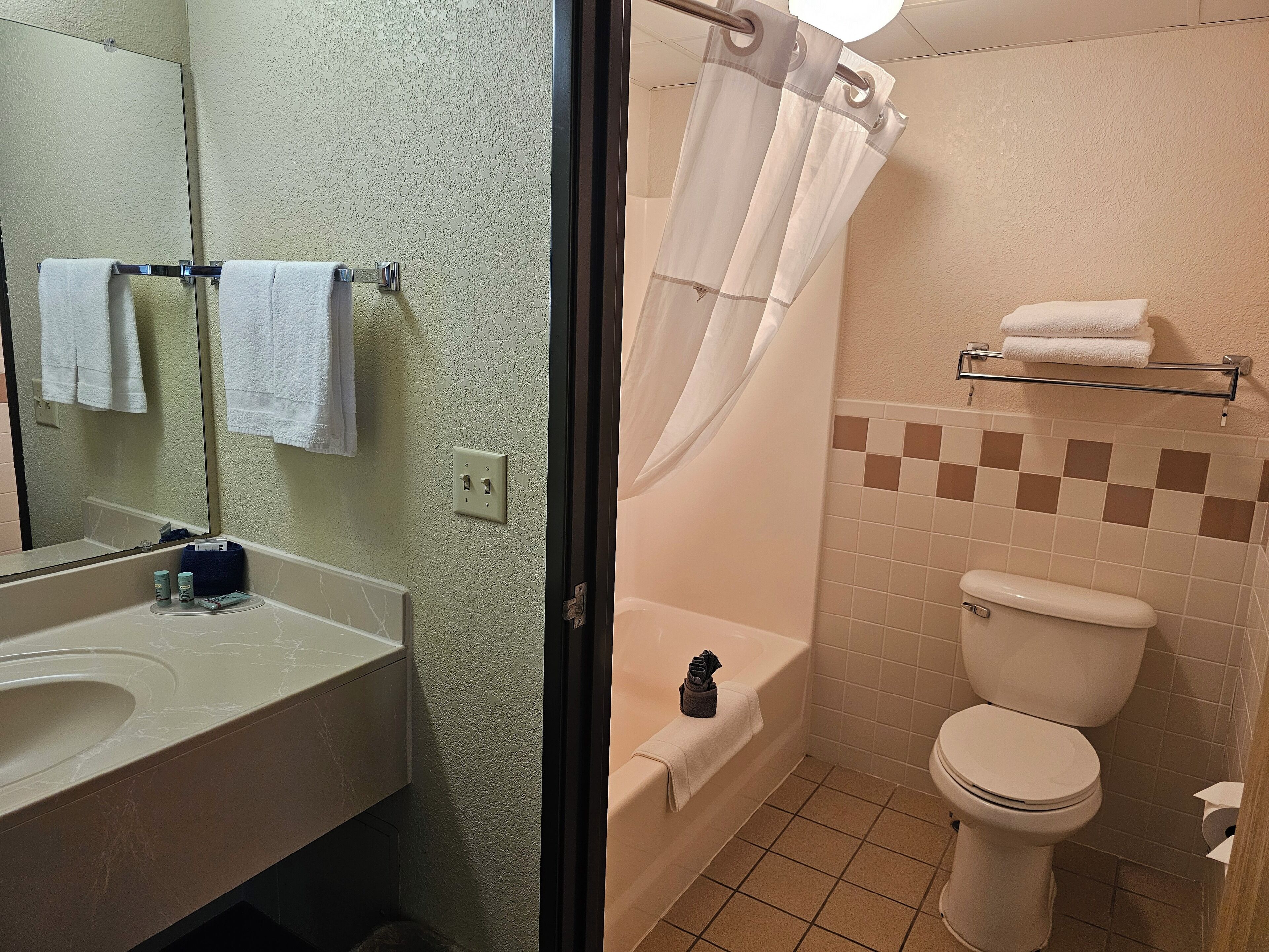 shower, free toiletries, hair dryer, towels