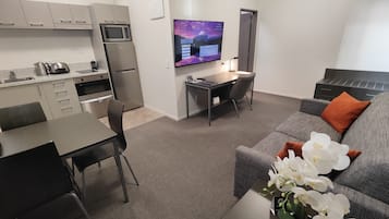 One Bedroom Apartment | Premium bedding, desk, laptop workspace, soundproofing