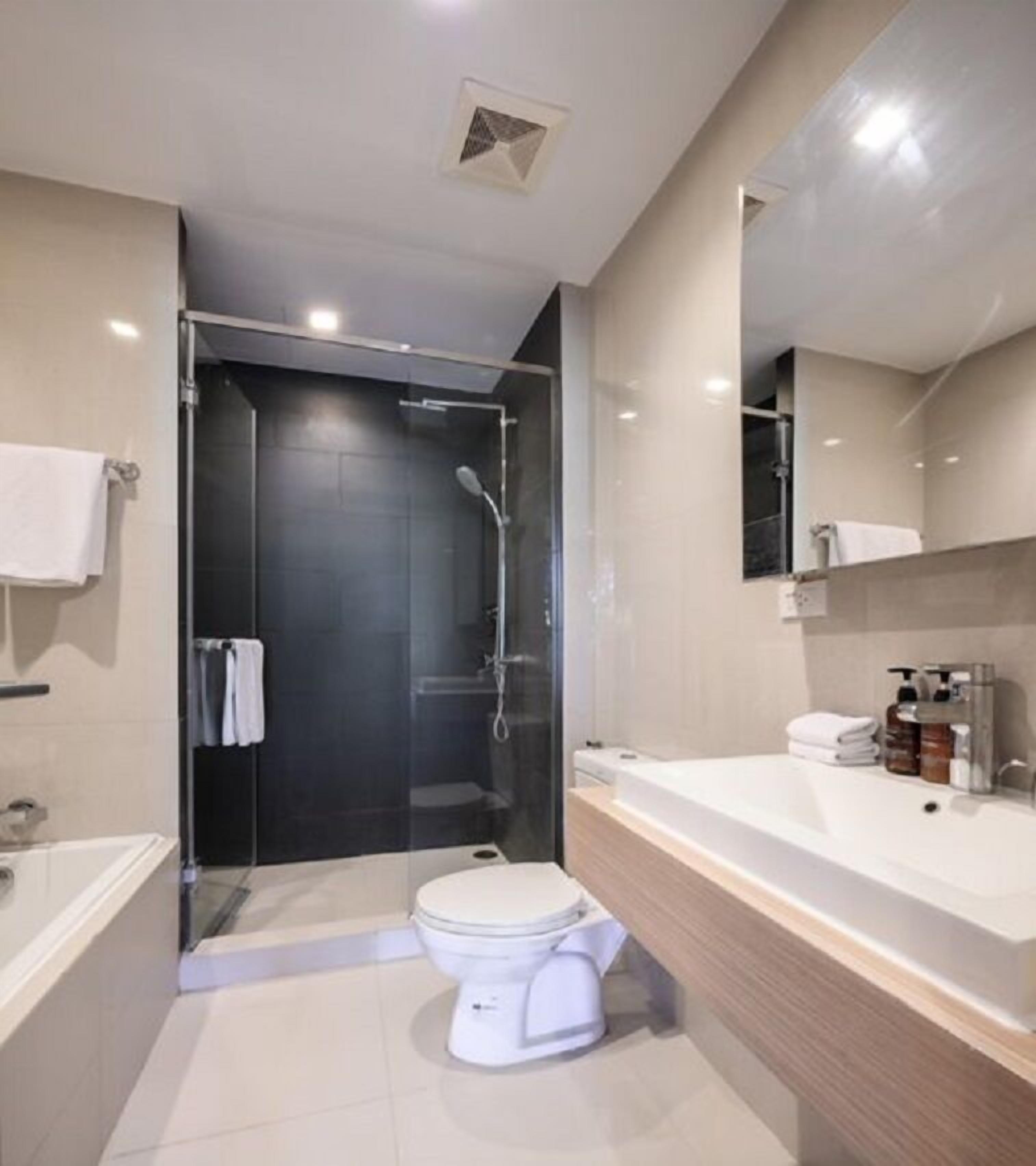 one bedroom suite - heated plunge pool | bathroom | combined shower/bathtub, spring water bathtub, hair dryer, bathrobes