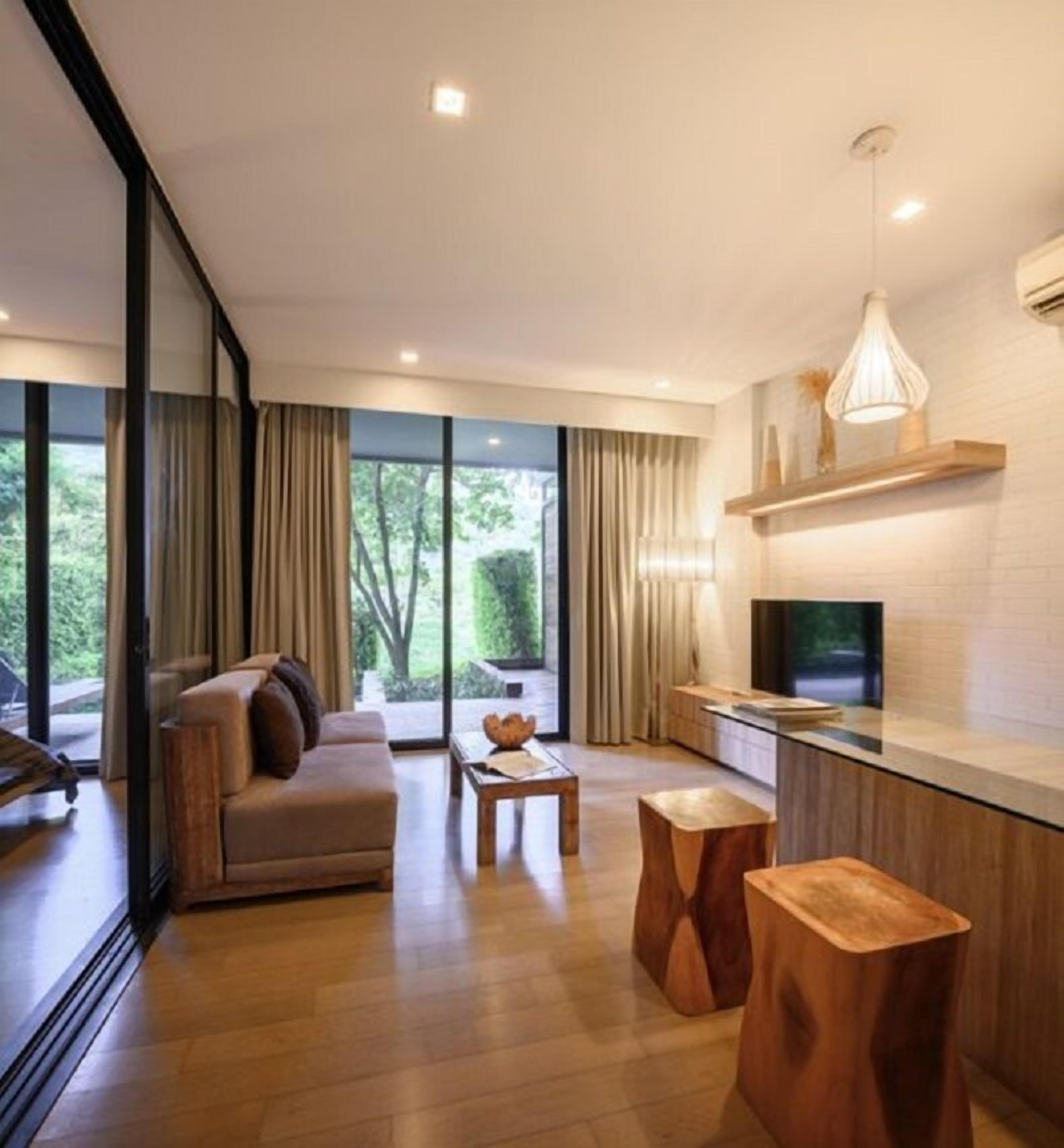 one bedroom suite - heated plunge pool | living room | 50-inch lcd tv with satellite channels, tv