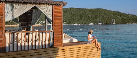 Private beach, white sand, beach cabanas, sun loungers