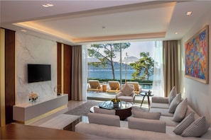 Poseidon Villa | Living area | 32-inch LCD TV with satellite channels, TV