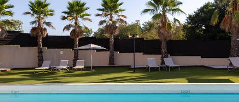 Indoor pool, seasonal outdoor pool, pool umbrellas, sun loungers