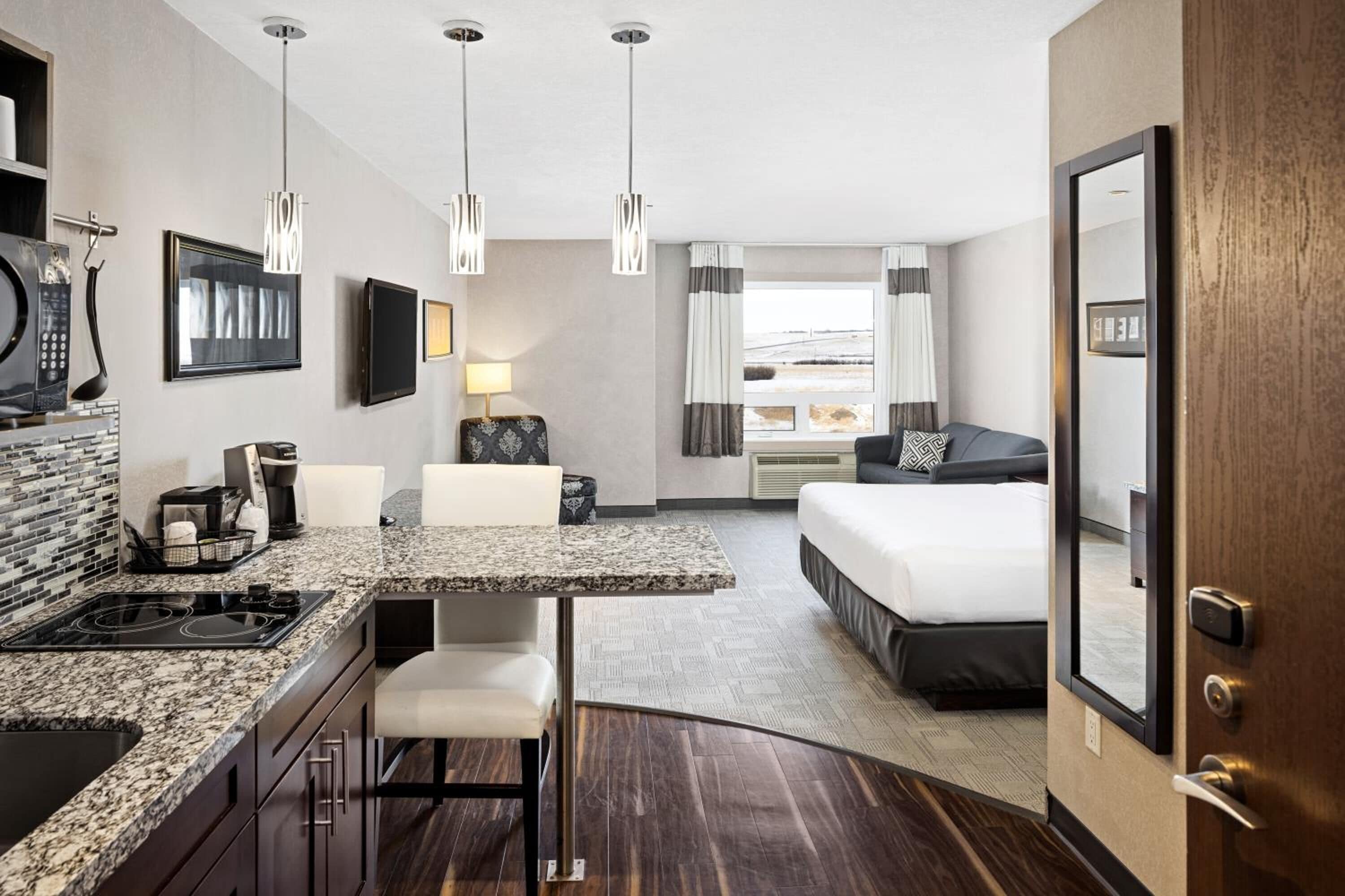 premium bedding, desk, laptop workspace, blackout curtains