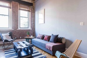 Habitación | Área de sala de estar | Televisión de pantalla plana 