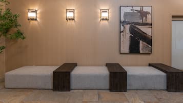 Relax in the waiting area with comfortable benches and a calming atmosphere.
