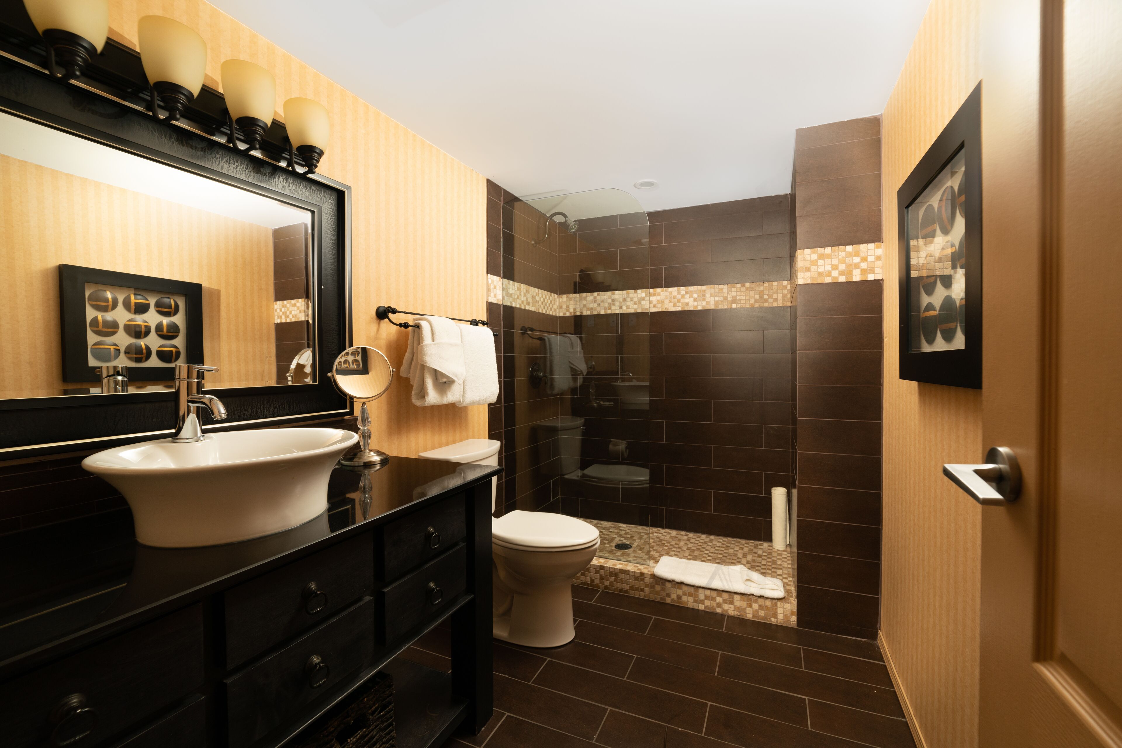 suite (african designer) | bathroom | designer toiletries, hair dryer, towels