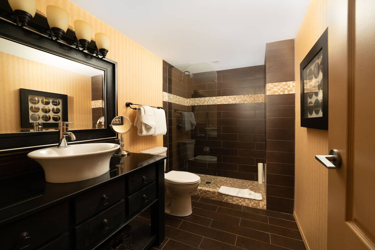 suite (african designer) | bathroom | designer toiletries, hair dryer, towels