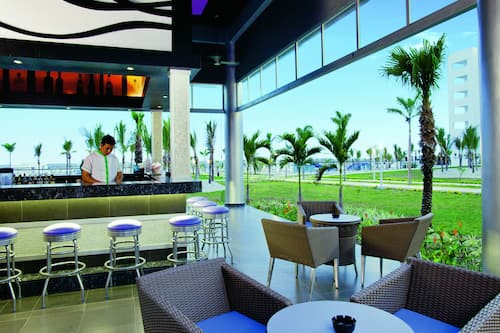 5 bars/lounges, swim-up bar, poolside bar