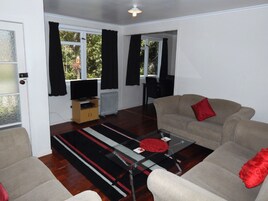 Three Bedroom House | Blackout drapes, iron/ironing board, free cribs/infant beds, free WiFi