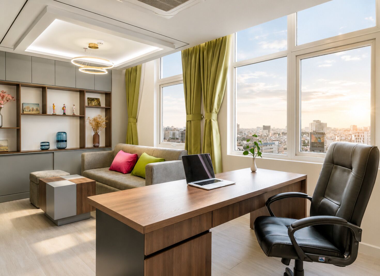 A modern office space with a desk, chair, sofa, and shelves.