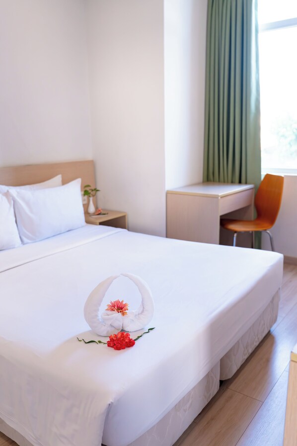Two Bedroom Executive | Minibar, in-room safe, desk, blackout drapes