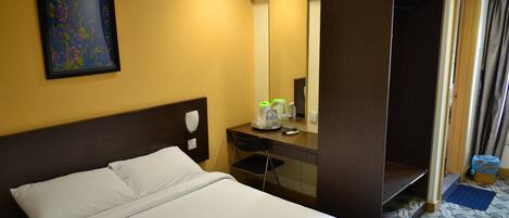 Desk, blackout drapes, WiFi (free), bed sheets