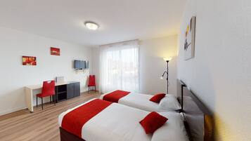 Standaard Twin kamer | Luxe beddengoed, een bureau, geluiddichte muren